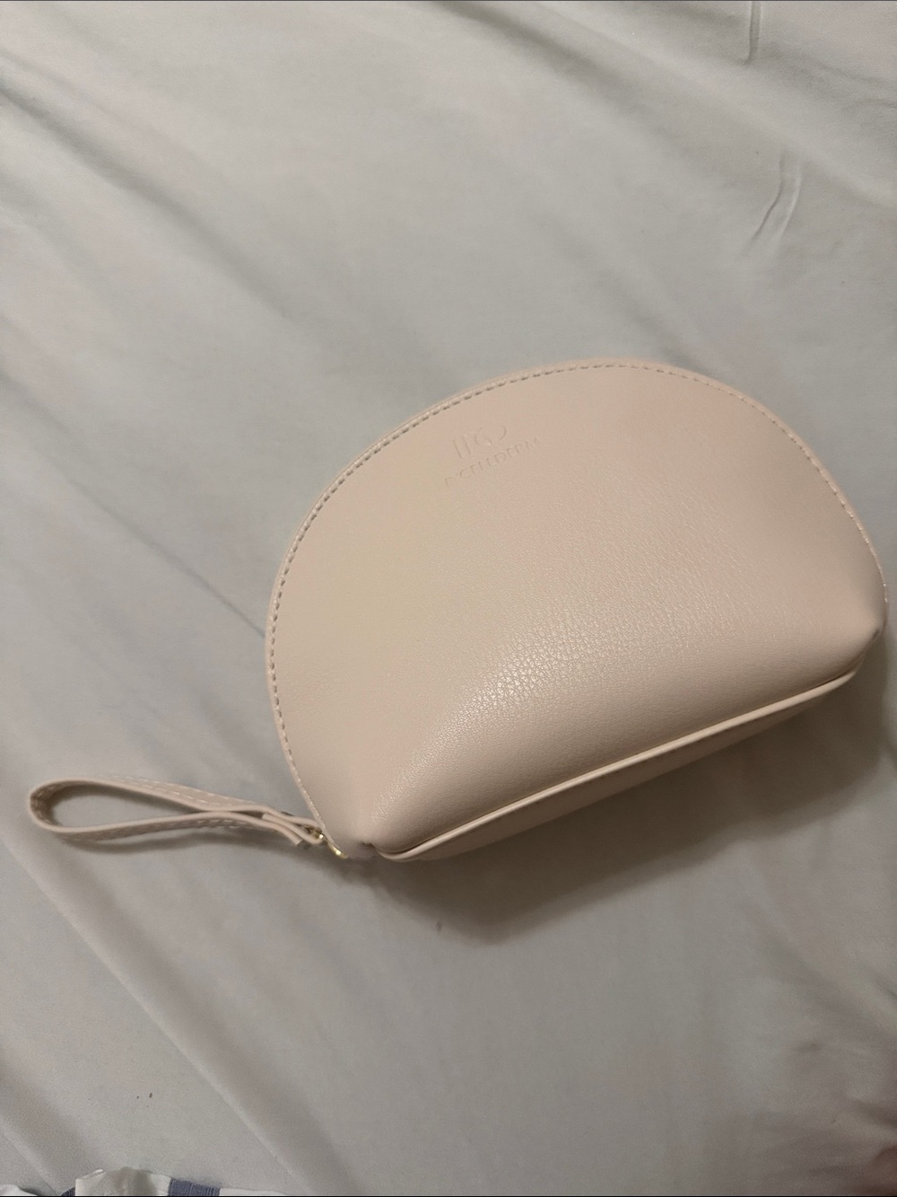 Women's Crescent Wristlet Pouch in cream color make up bag